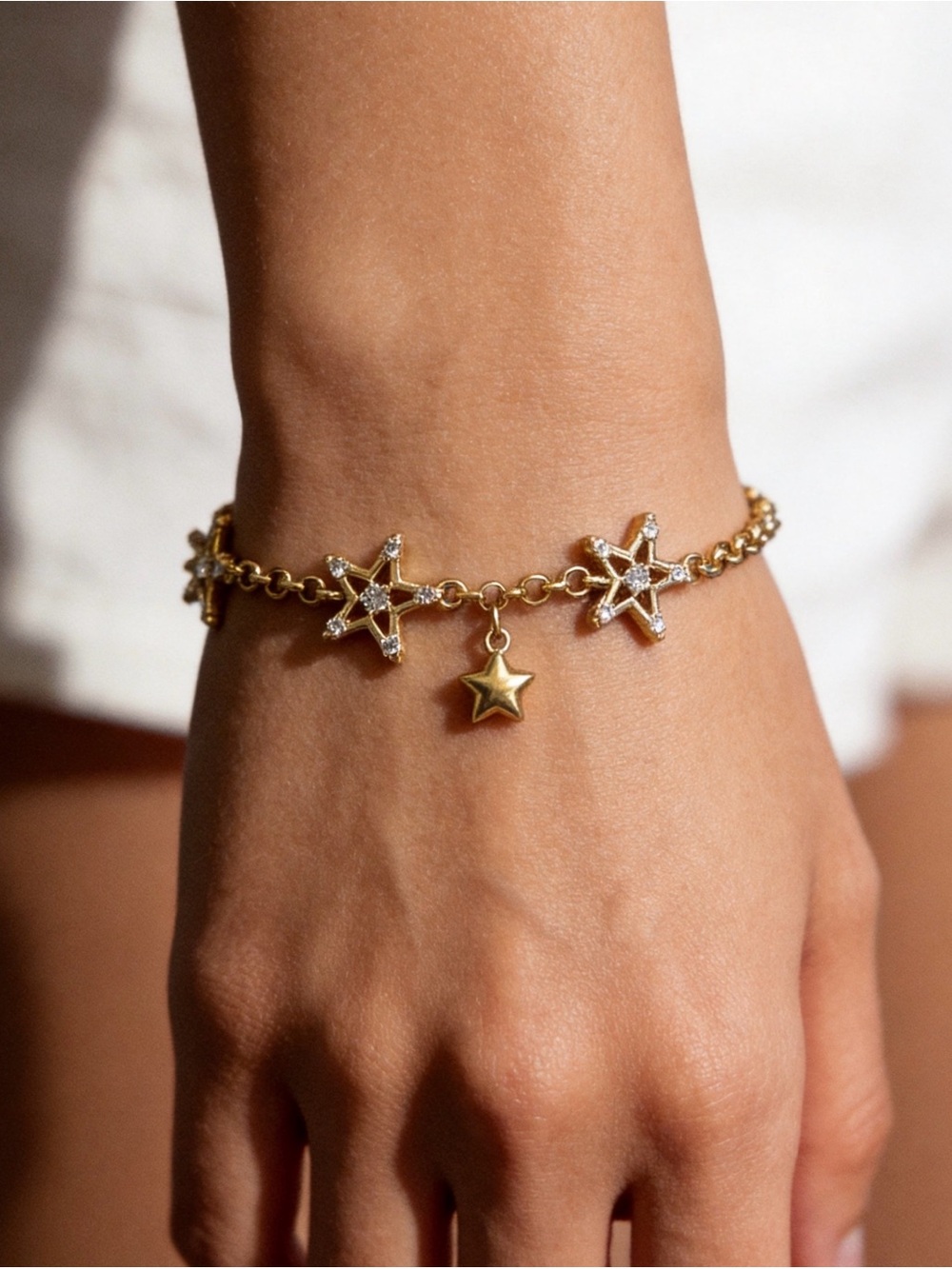 Gold Star Charm Bracelet with CZ Accents